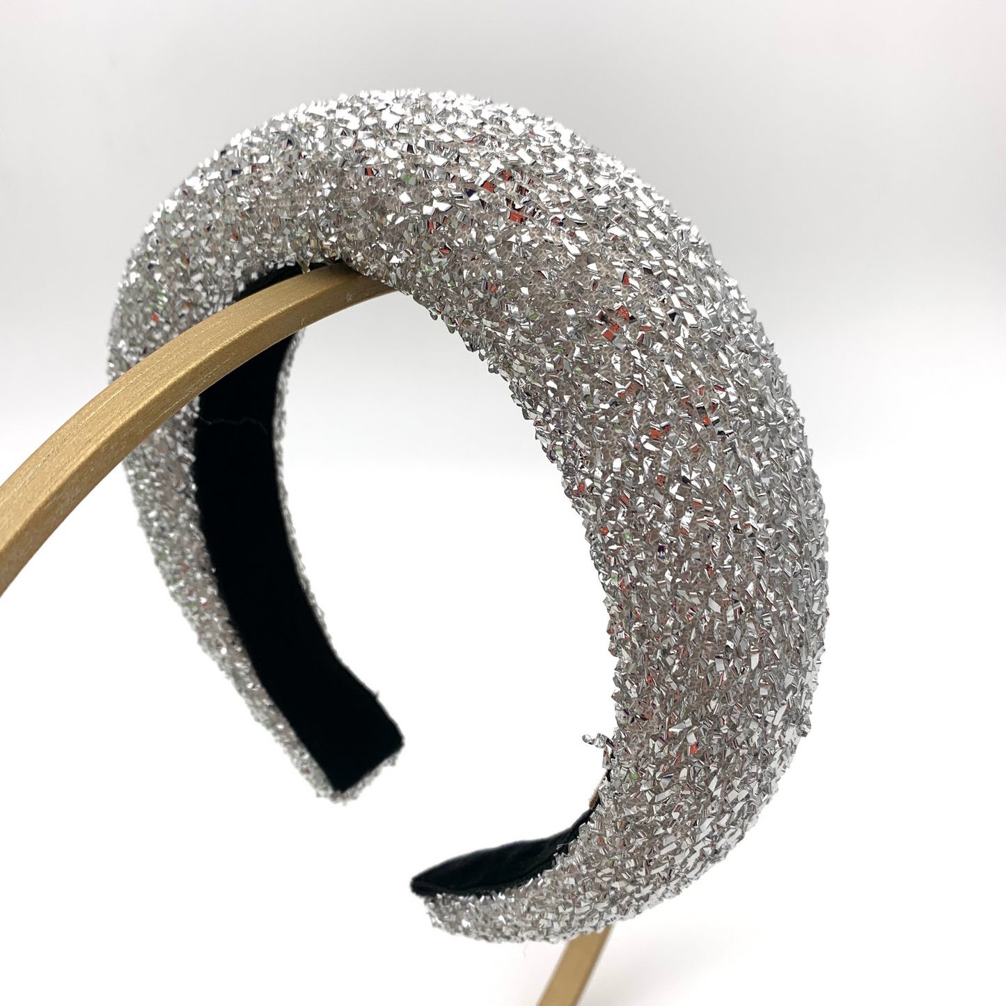 Silver tinsel 1 inch padded headband lined with black velvet ribbon