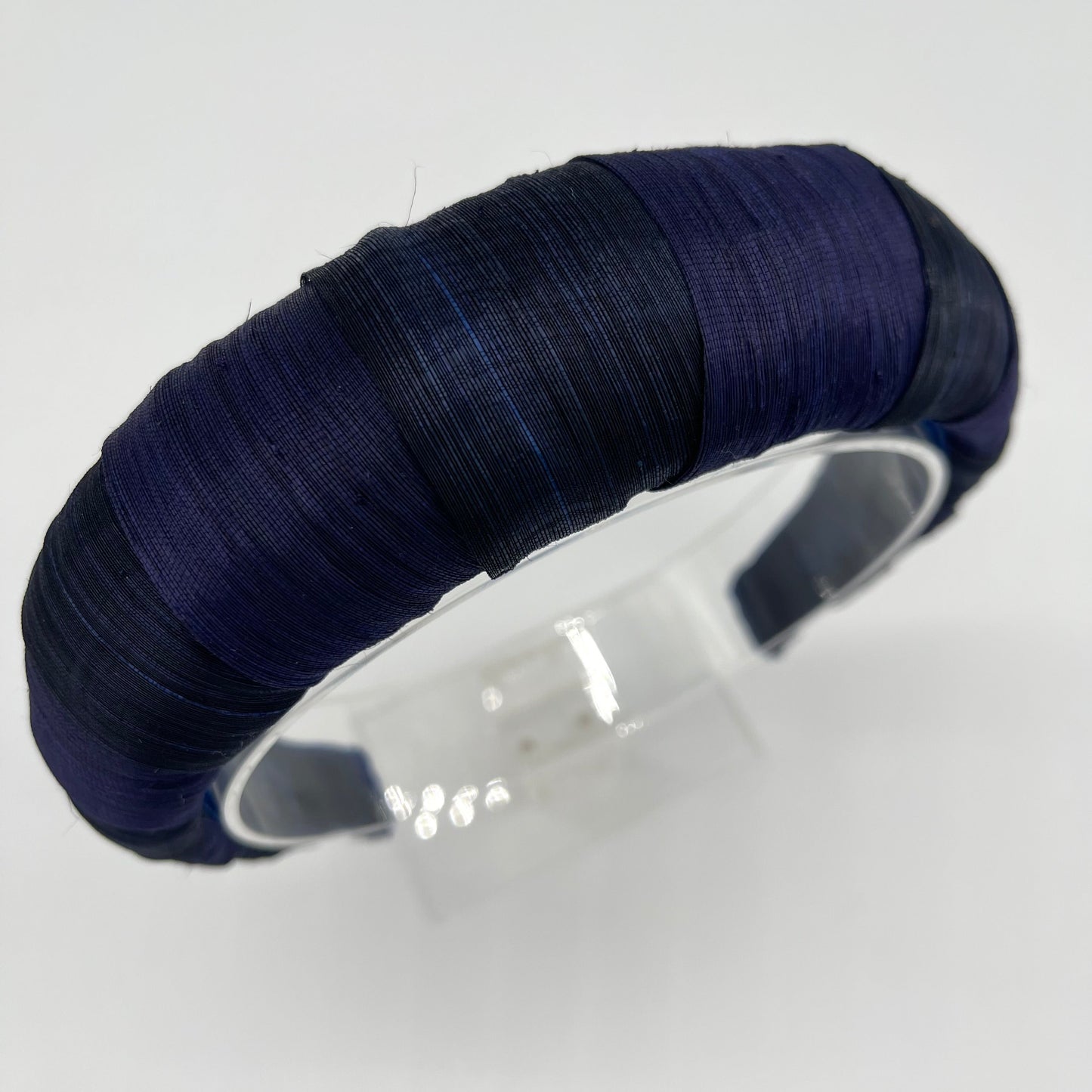 Silk abaca wrap headband in navy blue lined in velvet ribbon