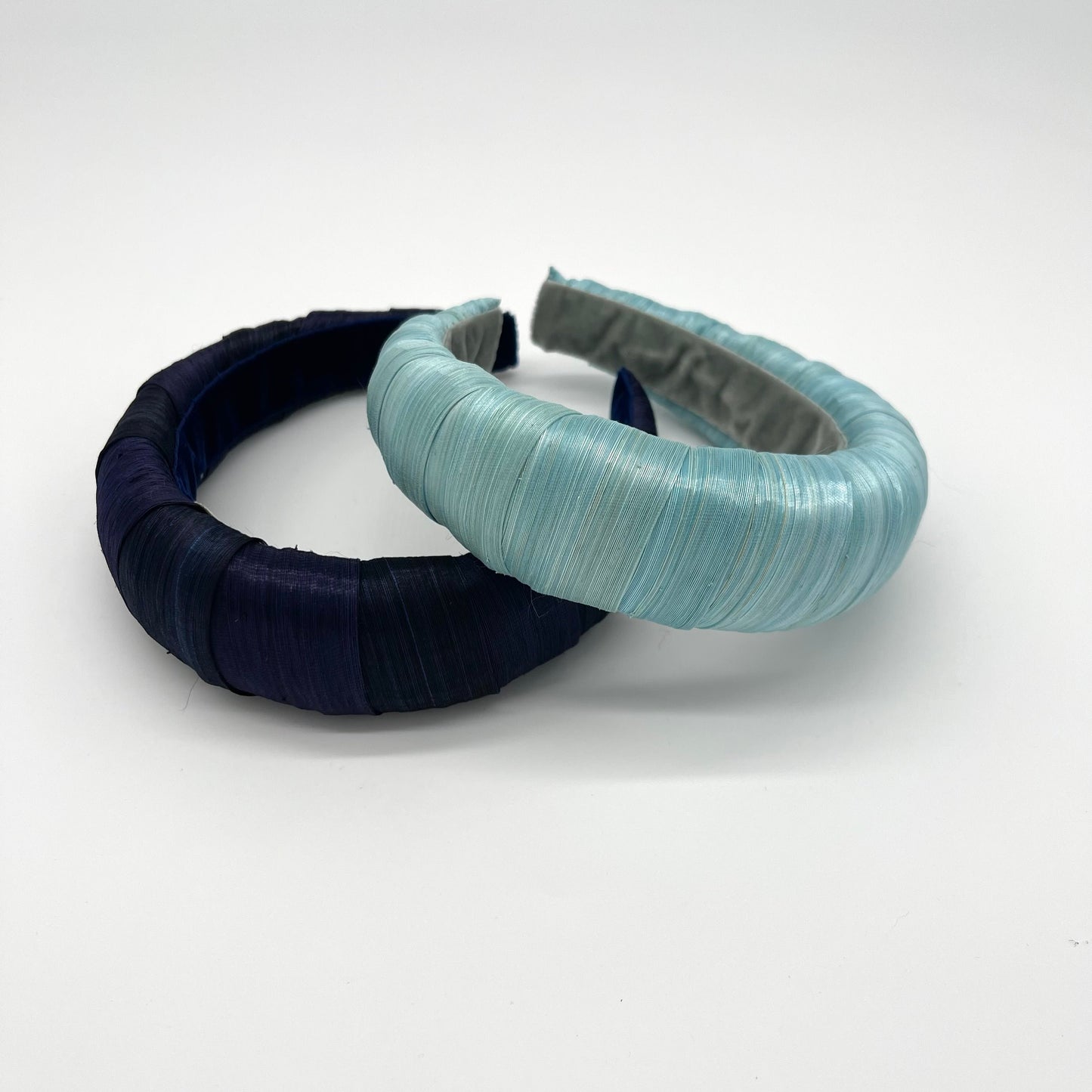 Silk abaca wrap headbands one in navy one in aqua, lined with velvet ribbon