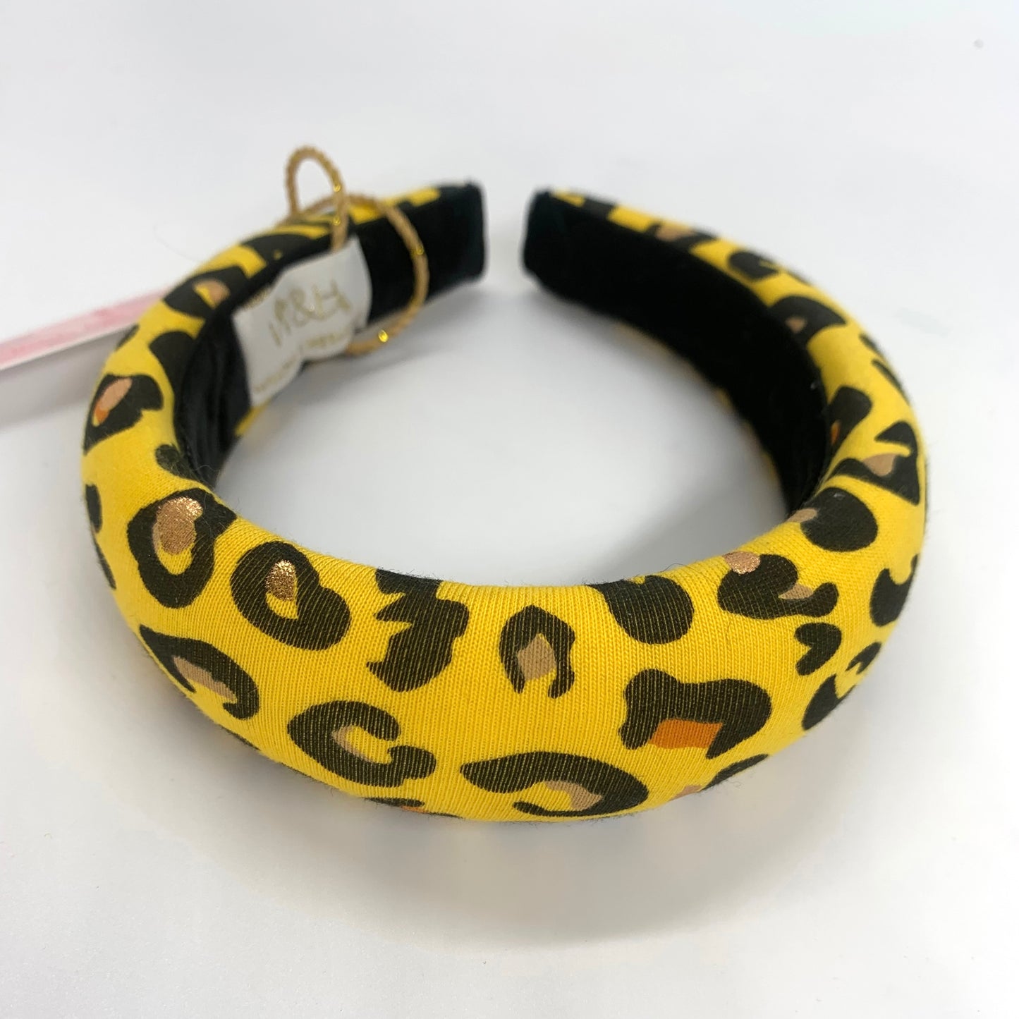 yellow and black leopard padded headband with metallic splats