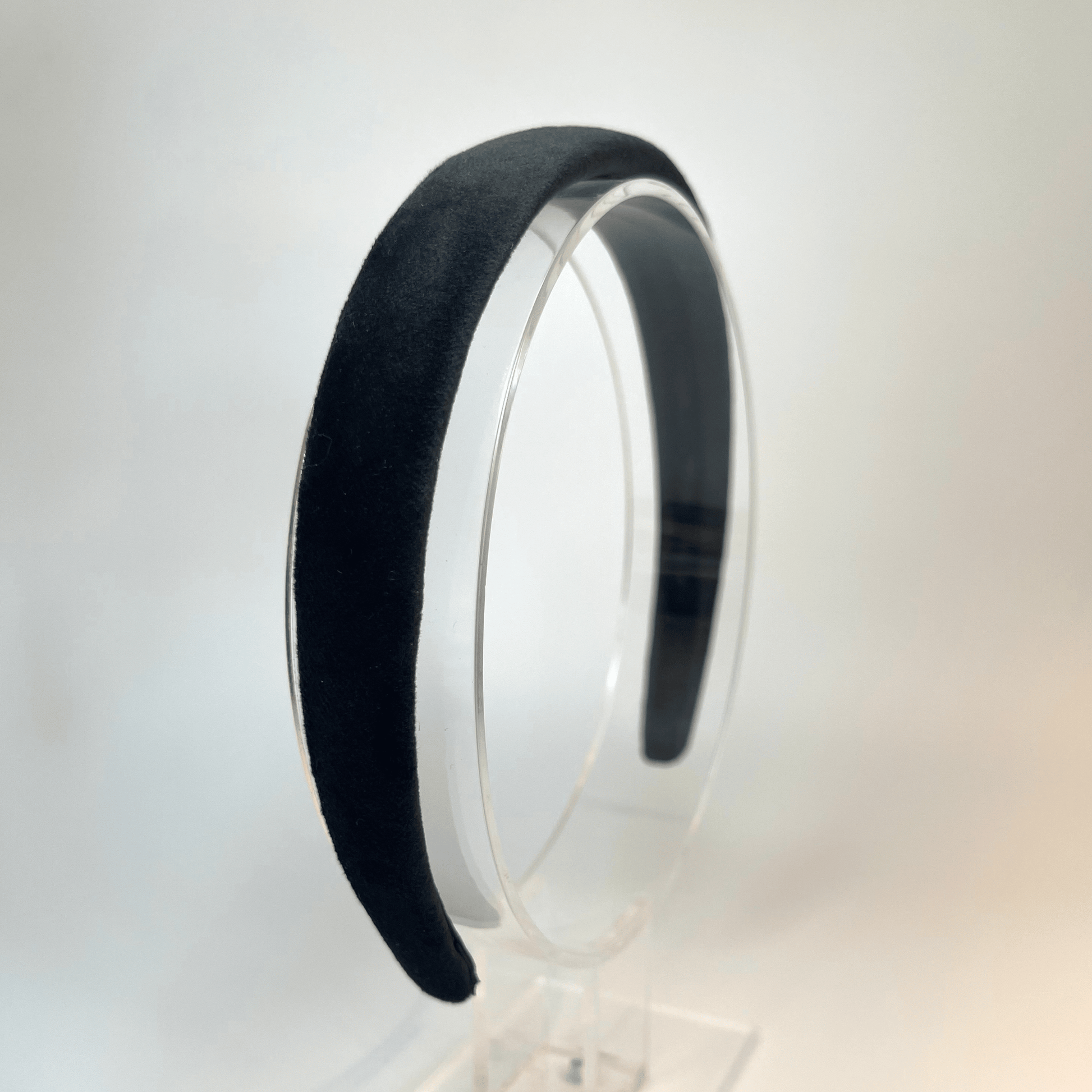 2cm black velvet Alice band lined with velvet ribbon.